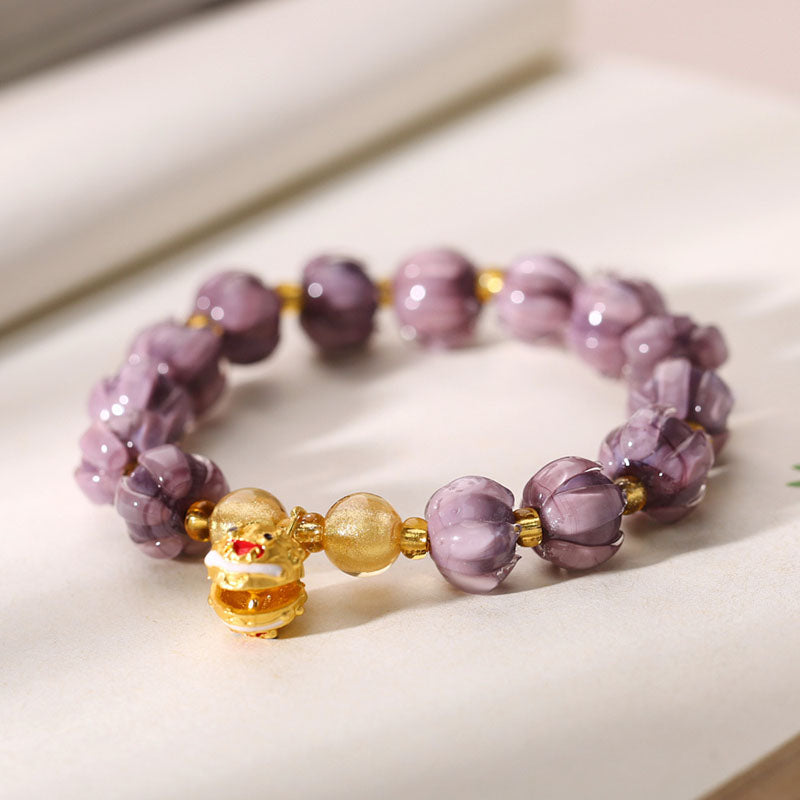 Purple lily of the valley flower lion bell bracelet