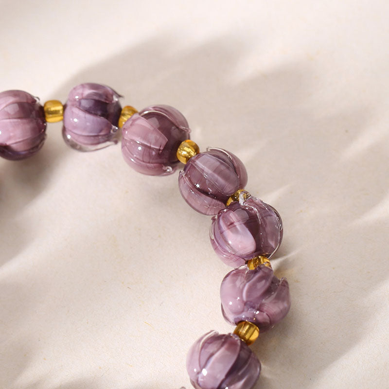 Purple lily of the valley flower lion bell bracelet