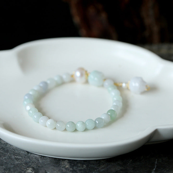 Emerald lotus bracelet
