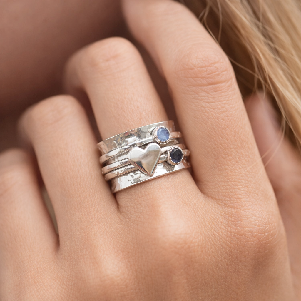 Elegant Rotating Heart Silver Ring