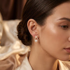 Gold Crisscross Pearl Stud Earrings 1
