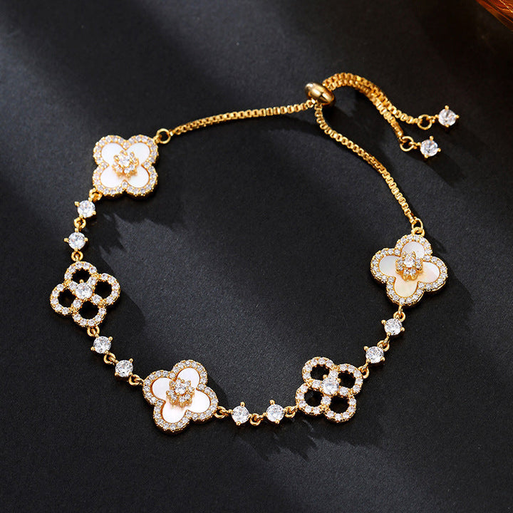 Four-leaf flower cluster �?natural shell bracelet