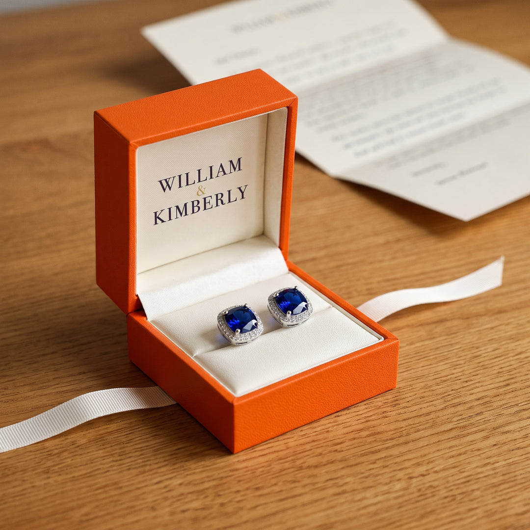silver-sapphire-halo-stud-earrings P
