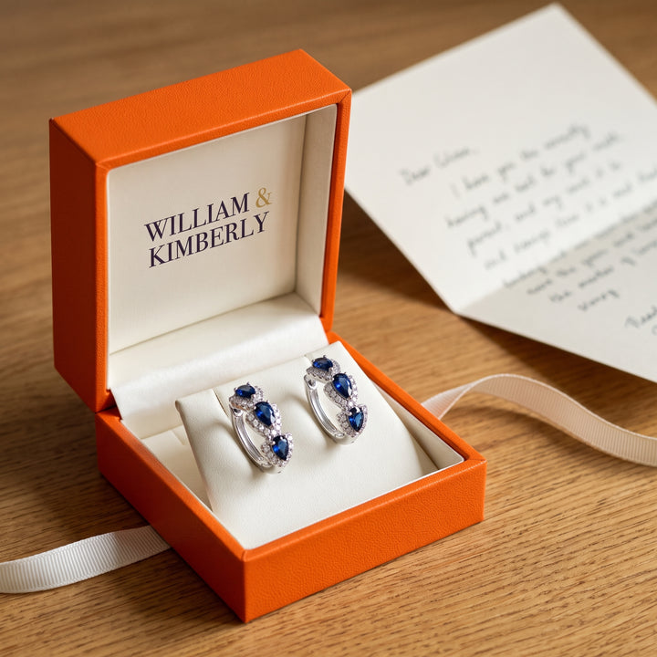 royal-sapphire-crest-earrings-white-gold-16k P