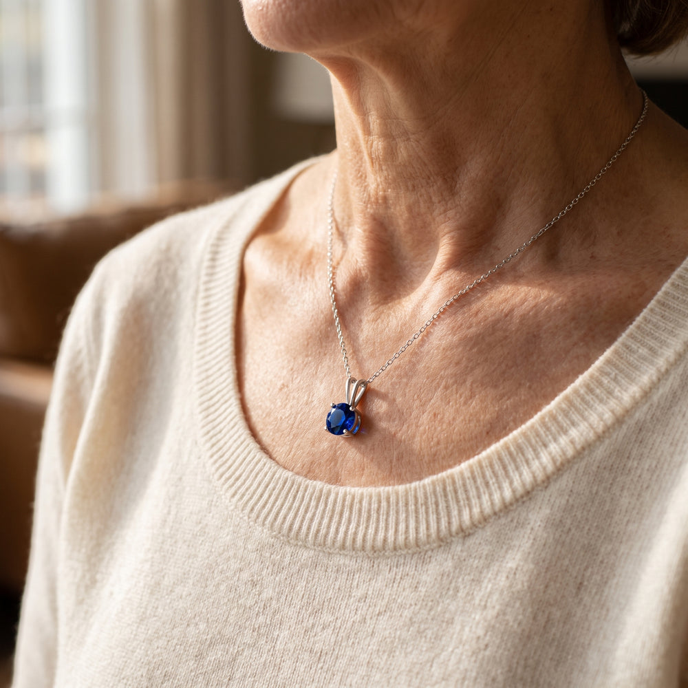 round-cut-sapphire-necklace-white-gold W